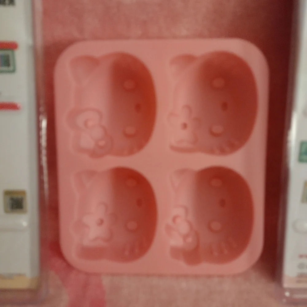 Hello Kitty Officially Licensed Cupcake Liners & Silicone Baking Pan Set